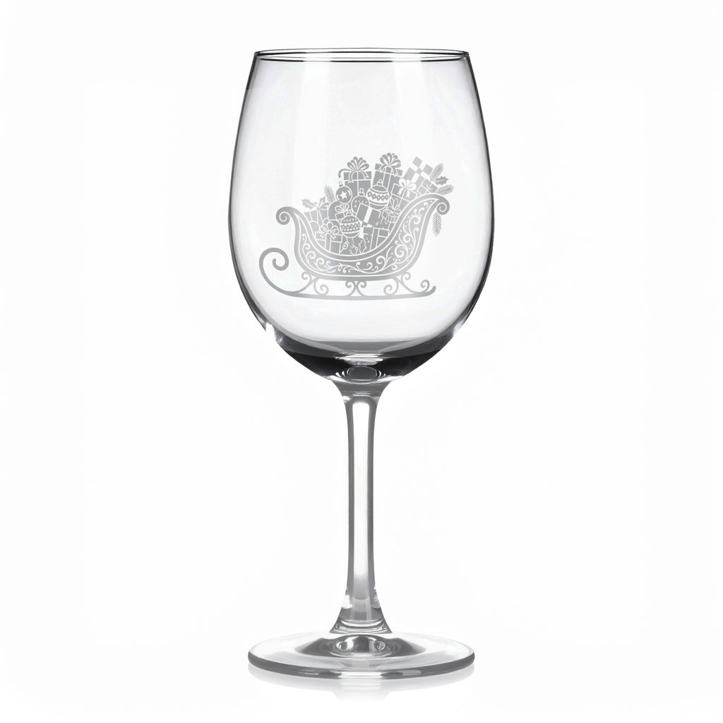 Sklenice na víno s gravírovaným motivem saní plných dárků