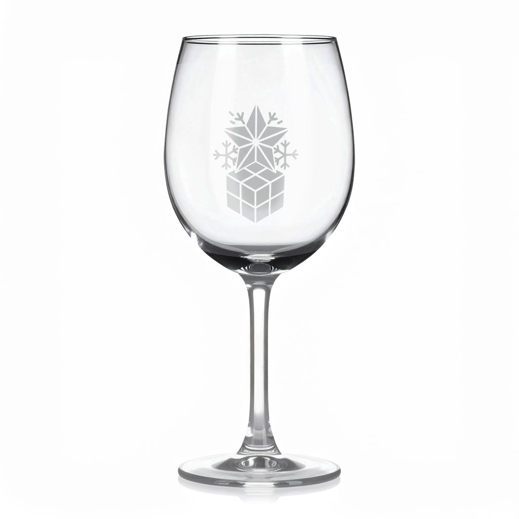 Sklenice na víno s gravírovaným motivem dárku s hvězdou a vločkami