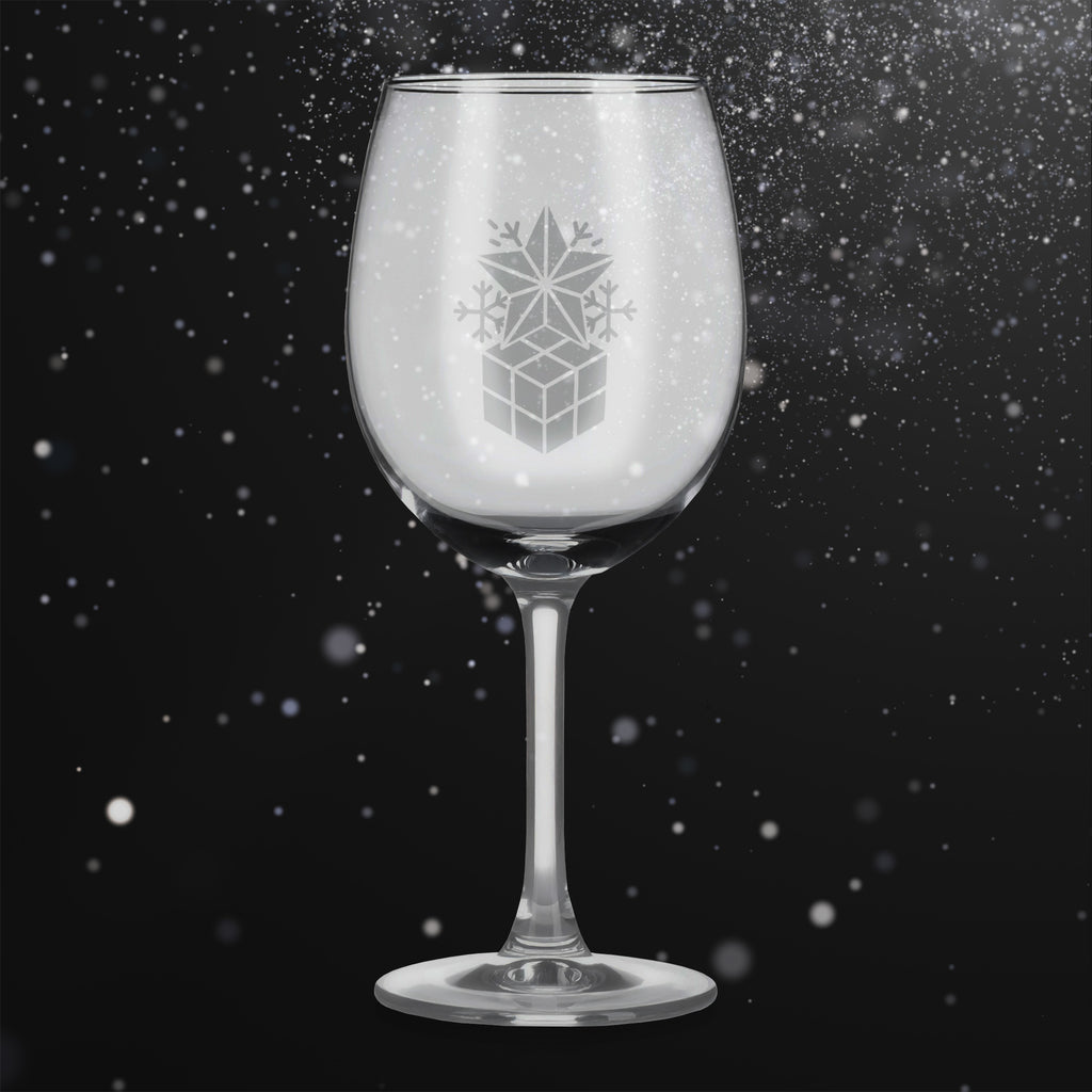 Sklenice na víno s gravírovaným motivem dárku s hvězdou a vločkami