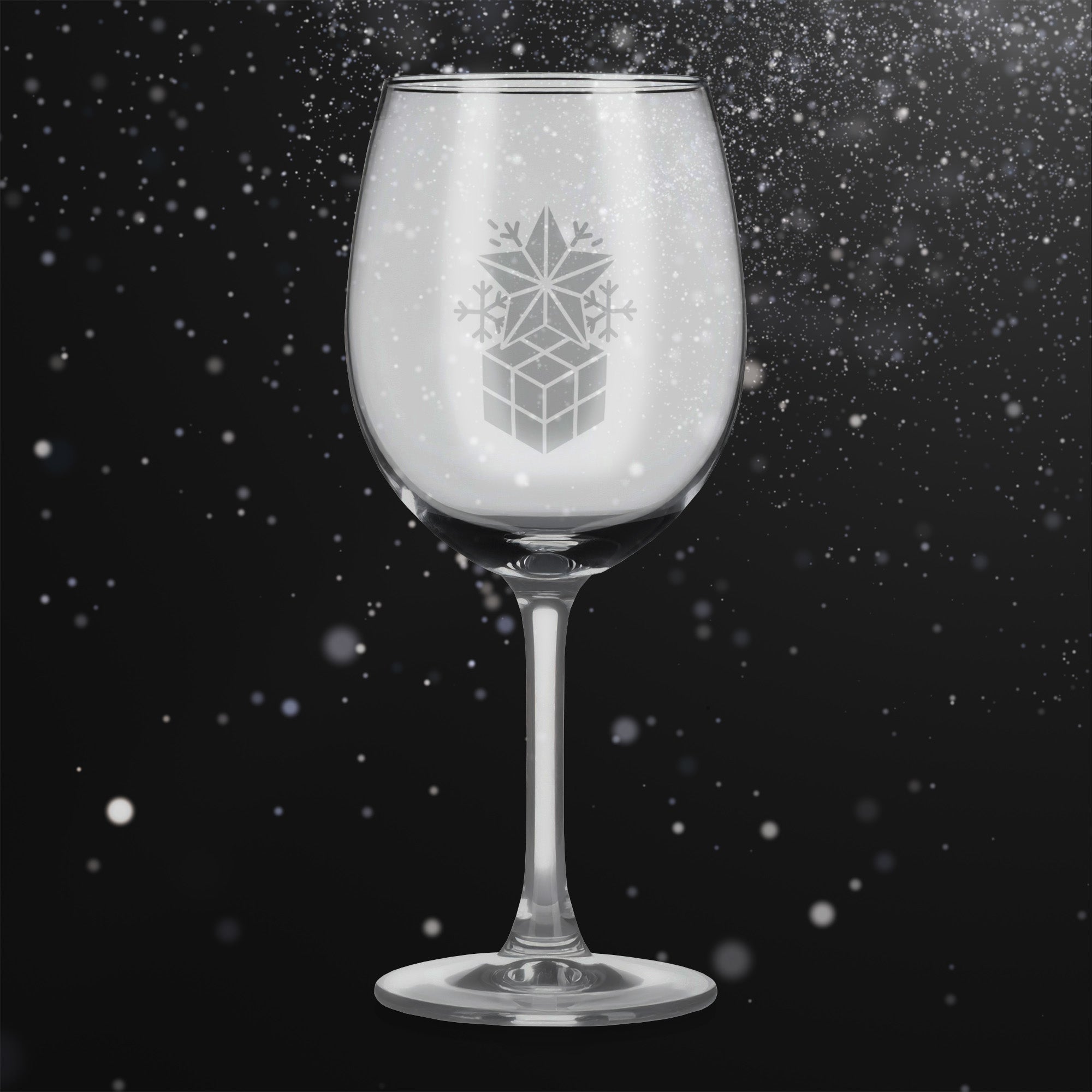 Sklenice na víno s gravírovaným motivem dárku s hvězdou a vločkami