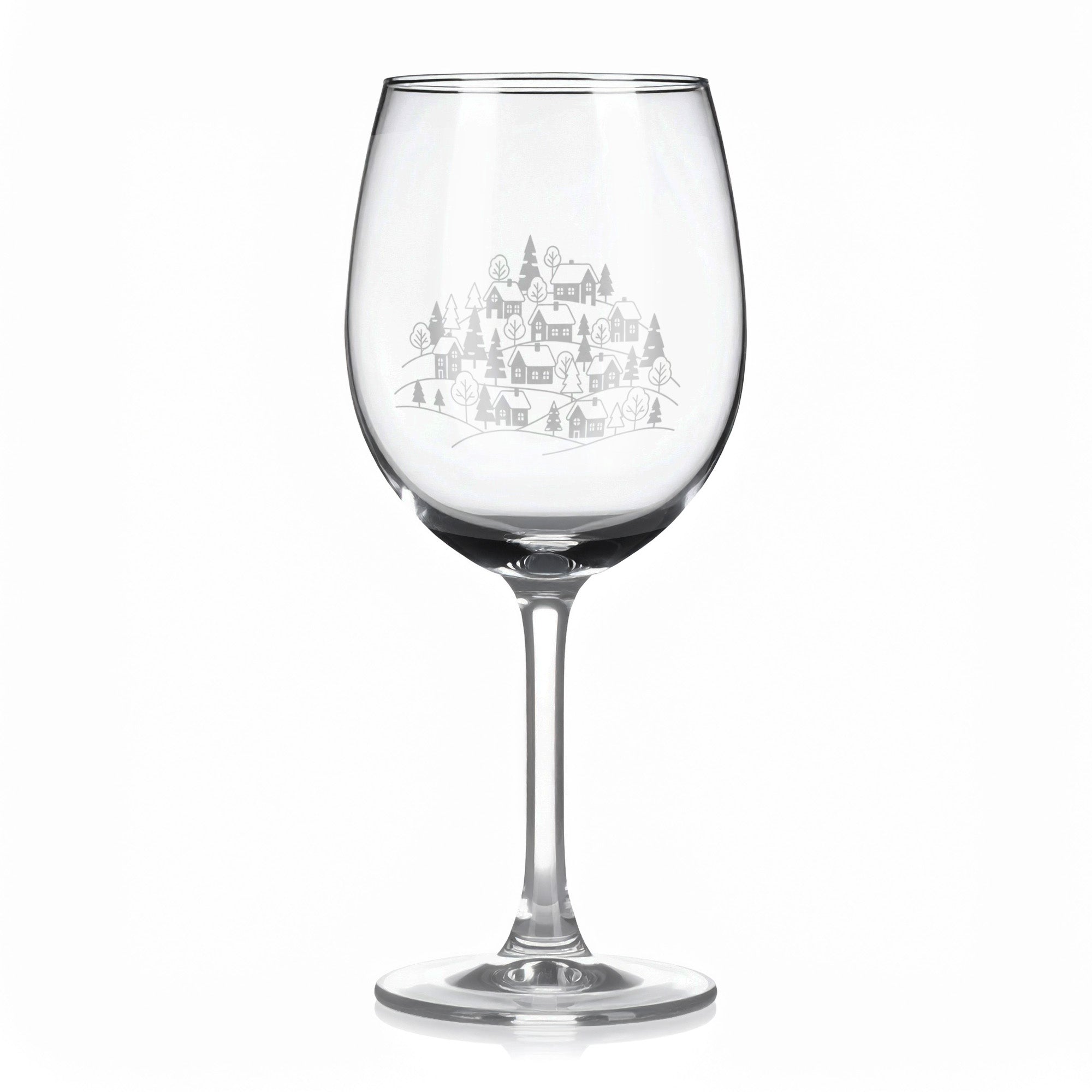 Sklenice na víno s gravírovaným motivem zimní městečko na kopci